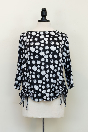Front of the Polka-Dot Blouse with Side Ties style 771 from Vine Street in the colors black and white