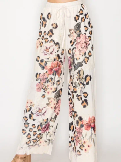 Front of the Relaxed Lace Patchwork Pants style 4703BG from Origami in the beige leopard flower print