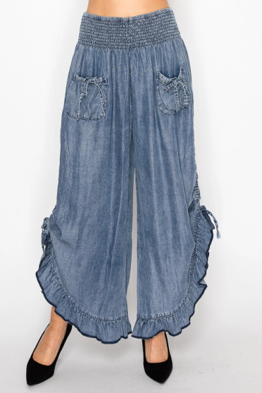 Front of the Smocked Ruffle Hem Side Tie Chambray Pants style 4932 from Origami in the color denim