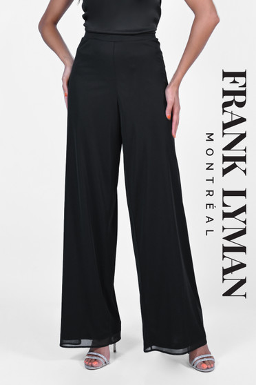 Model wearing the Chiffon Overlay Pants from Frank Lyman in the color black