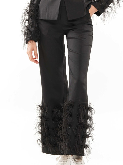Front of the Feather Bottom Pants from WHY Dress in the color black