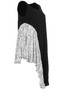 Side of the Erica Sleeveless Tunic from Kozan in the black and white print