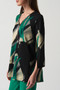 Side of the Abstract Fit-n-Flare Tunic from Joseph Ribkoff in the colors black and multi