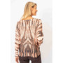 Back of the Zebra Symmetry Print Sweater from Look Mode in the color rust