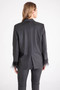 Back of the Soiree Feather Jacket from Isle by Melis Kozan in the color black