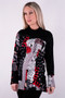 Front of the Zip Neckline Tunic from Michael Tyler in the colors black, ivory and red