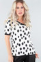 Front of the Polka Dot Short Sleeve Top from Michael Tyler in the colors ivory and black