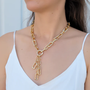 Model wearing the Gold Tassel Chain Necklace from OMG Blings