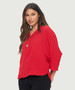 Side of the Flowy 2 Button Dolman Top from Last Tango in the color red