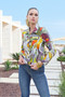 Model showing the front of the Botanica Jean Jacket from Dolcezza in the multicolor print