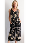 Front of the Belted Geo Print Jumpsuit from Soft Works in the colors black and tan
