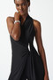 Close up of the Silky Knit Wrap Culotte Jumpsuit from Joseph Ribkoff in the color black