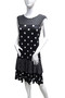 Front of the Polka-Dot Sleeveless Dress from Tango Mango style D9470 in the colors black and white