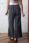 Back of the Retro Stripe Ankle Pants style 285210 from Olivia in the color black