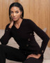 Front of the Asymmetric Grommet Sweater style A46008 from Alison Sheri in the color black