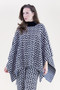 Front of the Geometric Turtleneck Poncho style FP65030-BKWT from Original USA in the colors black and white