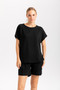 Front of the Relaxed T-Shirt Top style 421-15535 from Isle in the color black