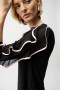 Close up of the Silky Knit Top with Chiffon Ruffled Sleeves style 261009 from Joseph Ribkoff in the colors black and pink