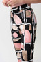 Close up of the Silky Knit Abstract Print Straight Pull-On Pants style 261309 from Joseph Ribkoff in the black/multi print