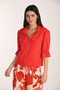 Front of the Short Puff Sleeve Zip Jacket style 266045 from Frank Lyman in the color lust