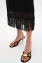Close up of the Pull-On Skirt With Fringe Trim style 262929 from Joseph Ribkoff in the color black