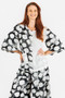 Front of the Polka Dot Wide Sleeve Top style FC261216 from Fashion Concepts in the shadow dots print
