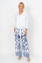 Front of the Eyelet Sleeve Tie-Front Blouse style 1782 from Look Mode in the color white