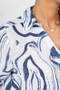 Close up of the Abstract Print Tie front Shirt style 8597GA from Look Mode in the colors white and blue