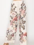 Front of the Relaxed Lace Patchwork Pants style 4703BG from Origami in the beige leopard flower print