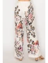 Back of the Relaxed Lace Patchwork Pants style 4703BG from Origami in the beige leopard flower print