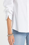 Close up of the Adjustable Sleeve Button Front Woven Top style LM8J54G52 from Liverpool Jeans in the color white