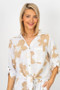 Front of the Gold Flower Print Tie front Shirt style 28597GF from Look Mode in the color white