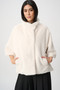 Front of the Chevron Faux Fur Cape-Style Jacket style 263917 from Joseph Ribkoff in the color cream