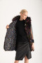 Inside of the Theo Faux Fur Vest style 485-4540 from Isle in the Brera print