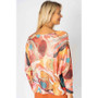 Back of the Abstract Print Batwing Sweater style 0935 from Look Mode in the color red