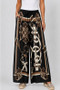 Front of the Belt and Chain Detailed Satin Pant style 64073 from Look Mode in the color black