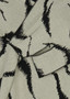 Close up of the Fari Poncho Top style SW-41045 from Kozan in the rhythm print