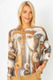 Front of the Face Printed Batwing Sweater style 0930 from Look Mode in the color rust