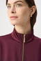 Close up of the Satin Puff Sleeve Utility Jacket style 264939 from Joseph Ribkoff in the color elderberry
