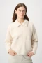 Front of the Detachable Faux Fur Collar Jacket style 264920 from Joseph Ribkoff in the color birch