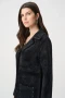 Close up of the Studded Sweater Coat style 264921 from Joseph Ribkoff in the color black