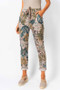 Front of the Leaf Print Jeggings style 21217 from Look Mode in the color taupe