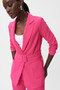 Model showing the front of the Belted Blazer from Joseph Ribkoff in the color pink