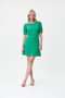 Model wearing the Zipper Sleeve Dress from Joseph Ribkoff in the color foliage green