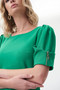 Close up of the Zipper Sleeve Dress from Joseph Ribkoff in the color foliage green