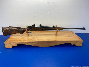 Winchester 70 7mm Rem Mag Blue 24" *STUNNING ENGRAVED MONTE CARLO STOCK!*