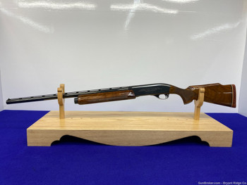 Remington Model 1100 T-Trap 12 Ga. Blue 25" *B GRADE AMERICAN WALNUT STOCK*
