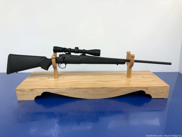 2005 Remington 700 .204 Ruger Black 24" *MOUNTED REDFIELD SCOPE*