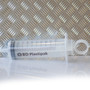 100ml syringe on plain background