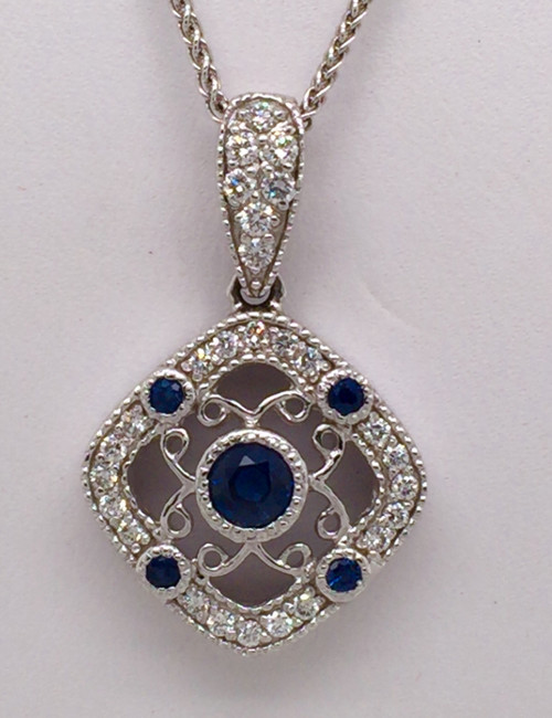 14 karat white gold sapphire and diamond pendant